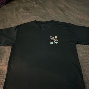 Black Graphic T-Shirt with Floral Design